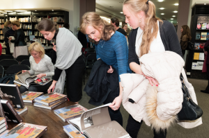 Visitors leafing through the book at Waterstones.