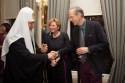 Ivan Lindsay and Lady Olga Maitland welcoming Patriarch Kirill of Moscow at the Cavalry and Guards Club in Piccadilly