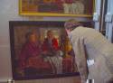 Stozharov - Ivan Lindsay examining a rare interior with figures round a table, October 2007